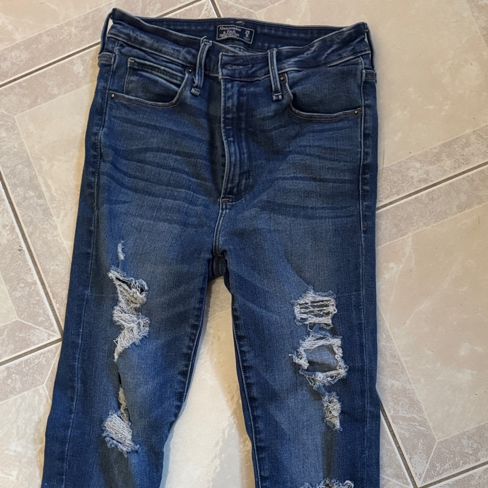Distressed Blue Jeans